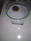 صورة  عملة نقدية في كوب ماء جامد.jpg